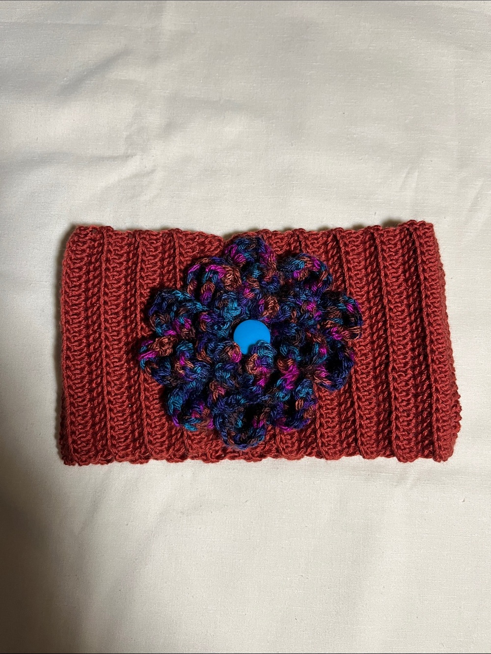 Handmade Rust Crochet Ear Warmer/Headband with Multicolor Flower Accent